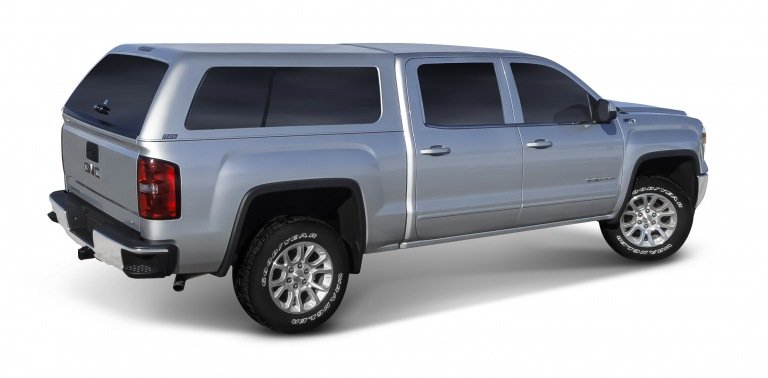 A.R.E. fiberglass truck cap installed on pickup truck bed